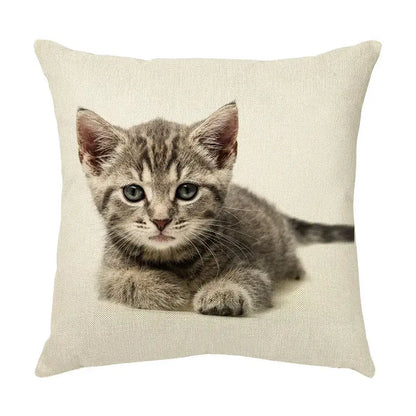Beige linen throw pillow with a cute cat face decorative gray tabby kitten featuring striking blue eyes for living room