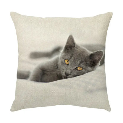 Beige linen throw pillow with cute cat face print of gray kitten with yellow eyes for living room decor
