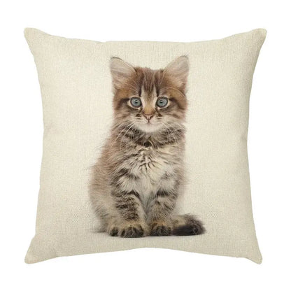 Beige linen throw pillow with cute cat face featuring a fluffy tabby kitten and striking blue eyes decorative cushion
