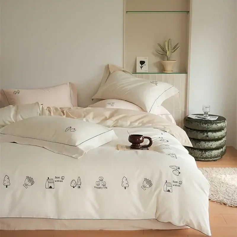 Cream embroidered brushed volcanic fleece bedding set in cream with black tree and house illustrations for bedroom decor