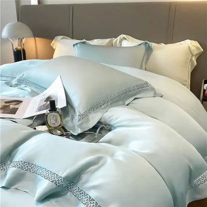 Light blue satin bedding set with silver geometric embroidery made from cream eucalyptus fiber by decorbites eucalyptus fiber