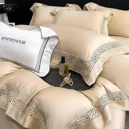 Cream eucalyptus lyocell 1000tc bedding set in satin with lace trim and a white pillow embroidered lovewehouse decorbites eucalyptus lyocell
