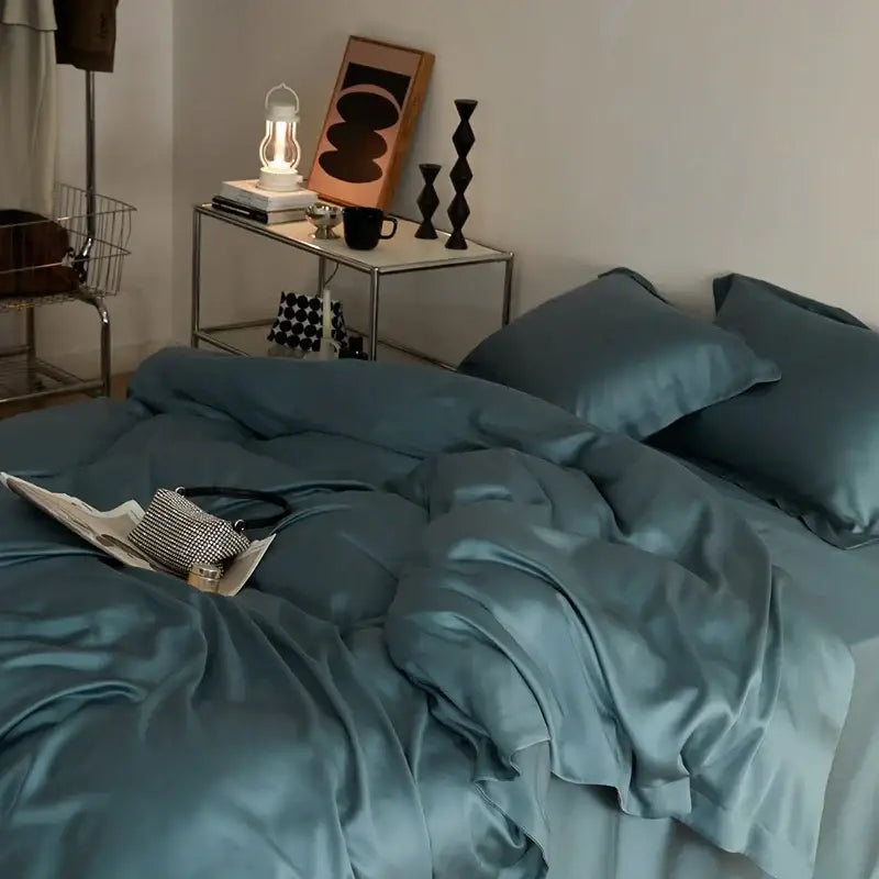 Teal satin bedding set with a smooth glossy finish from decorbites eucalyptus lyocell luxury collection for bedroom decor
