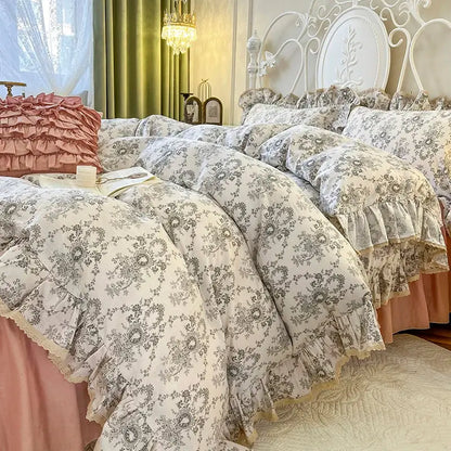 The cream floral bedding set features double layer lace and lace ruffles with soft gray and cream tones