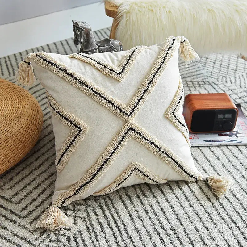 Cream cushion cover with black and beige geometric embroidery and tassels for decorbites geometric embroidery living room decor