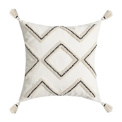 Cream cushion cover with geometric embroidery and tassels featuring decorbites geometric embroidery design for living room decor