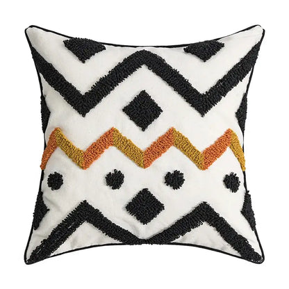 Cream geometric embroidery cushion cover with black and orange zigzag patterns made of textured plush fabric by decorbites geometric embroidery