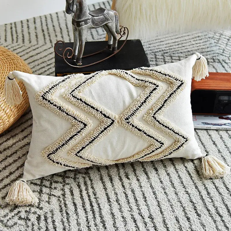 Cream cushion cover with black and cream decorbites geometric embroidery and tassels for living room decor