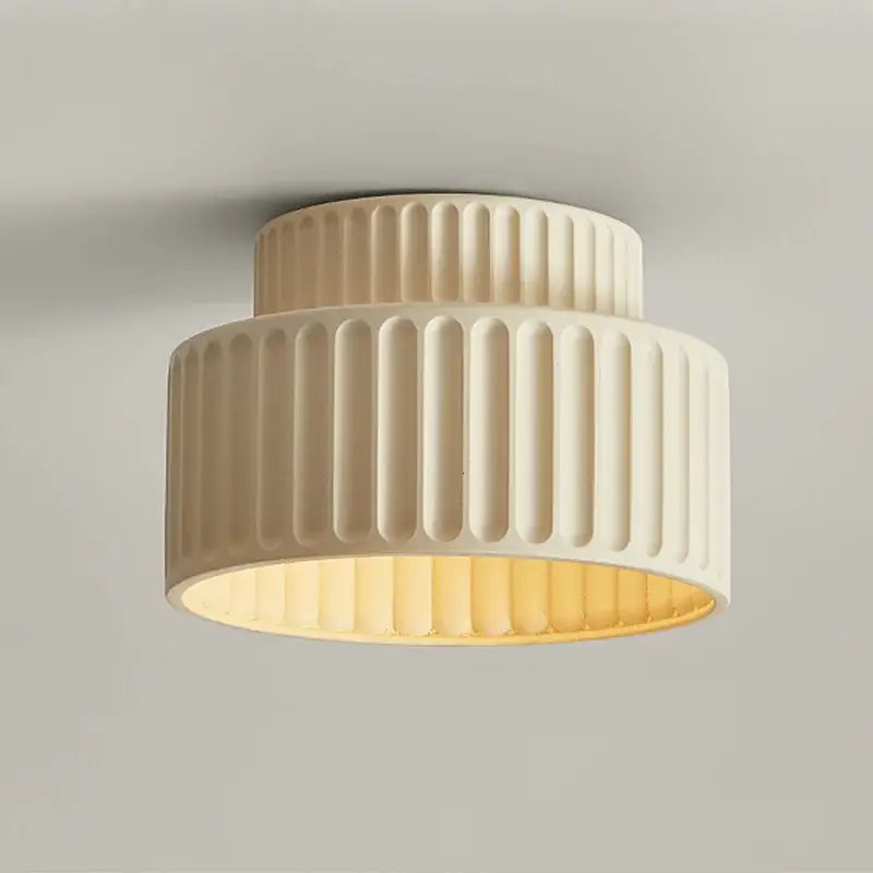 Cream green led chandelier lamp with cream-colored ribbed design and warm yellow glow for dining room lighting