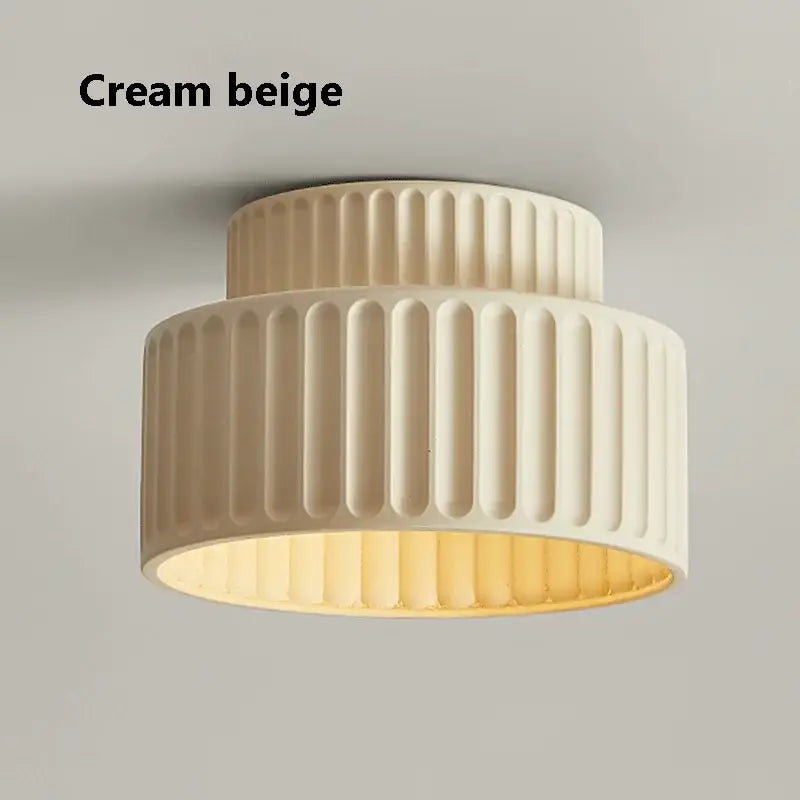 Cream beige ribbed ceiling light with warm glowing interior for cream green led chandelier lamp in dining room