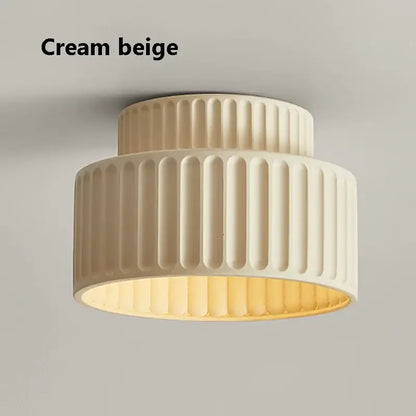 Cream beige ribbed ceiling light with warm glowing interior for cream green led chandelier lamp in dining room