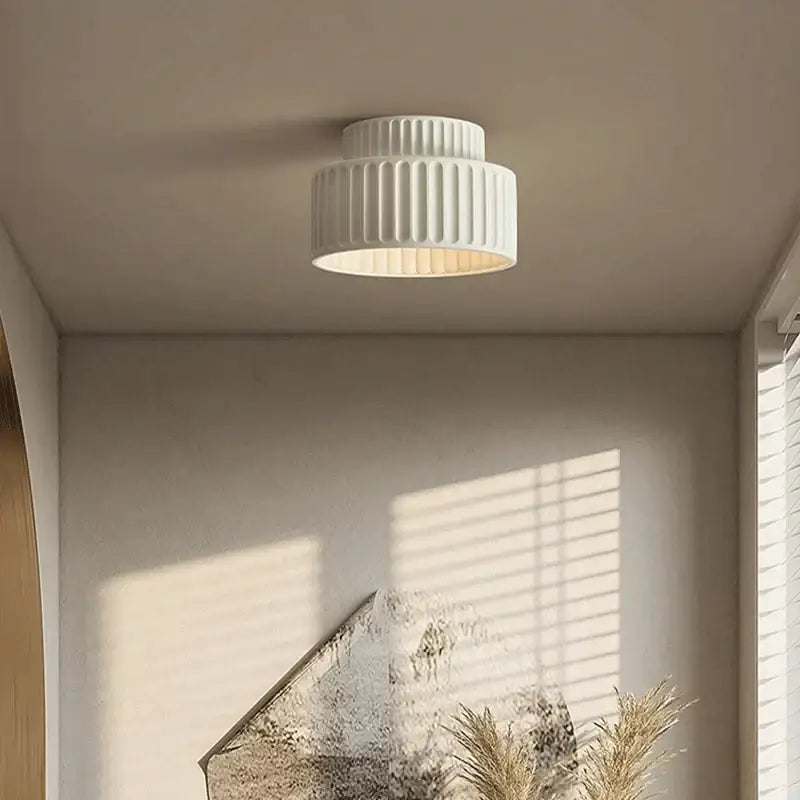 Cream green led chandelier lamp featuring a white ribbed ceiling light with modern design for dining room use