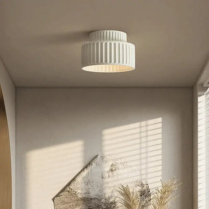 Cream green led chandelier lamp featuring a white ribbed ceiling light with modern design for dining room use