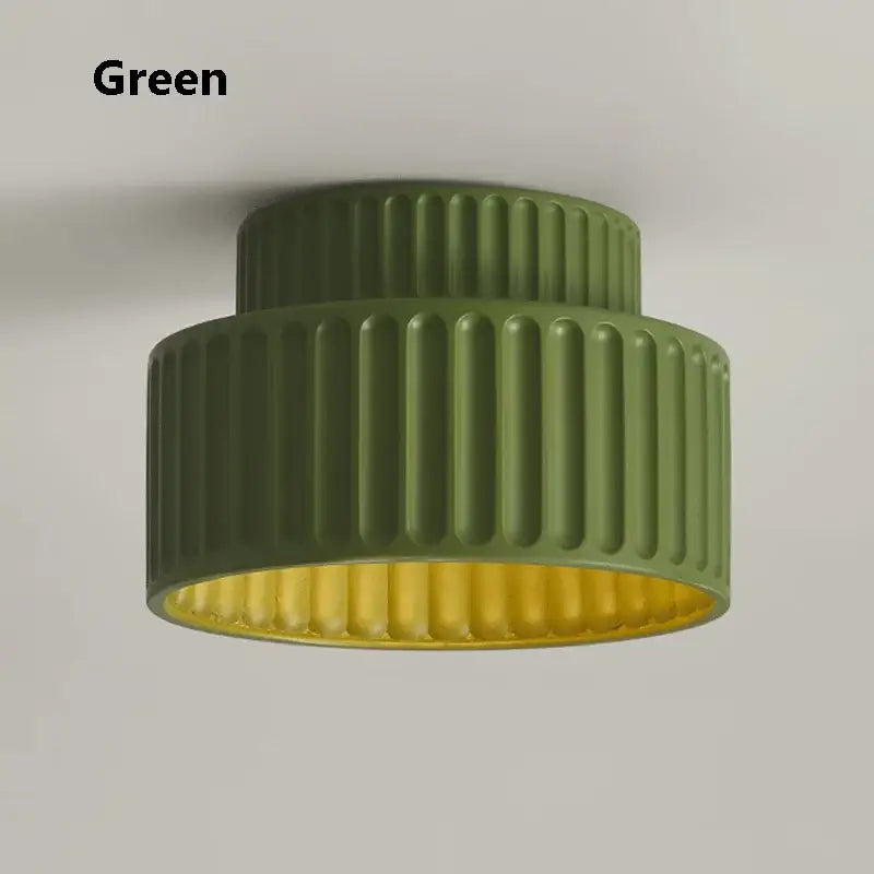 Olive green ribbed led chandelier lamp with gold interior for dining room lighting featuring cream green led design