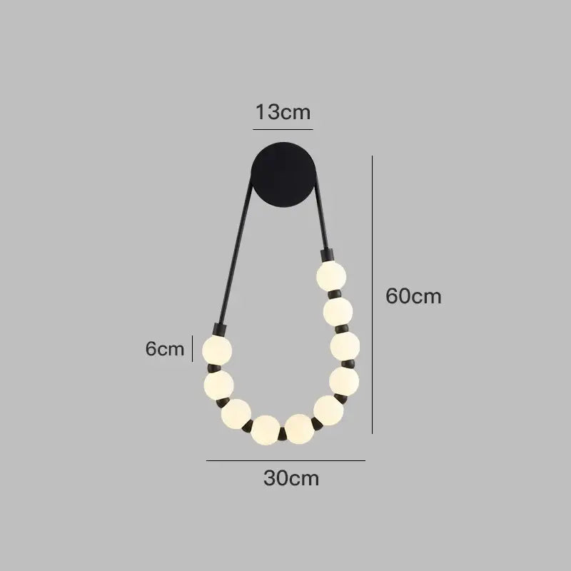 Black pendant wall lamp with cream italian style spherical beads on black cords for decorbites cream italian decor