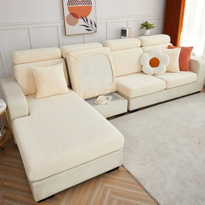 Cream jacquard l sofa seat cover in cream stretch fabric with subtle ribbed texture snugly fitted over sectional sofa