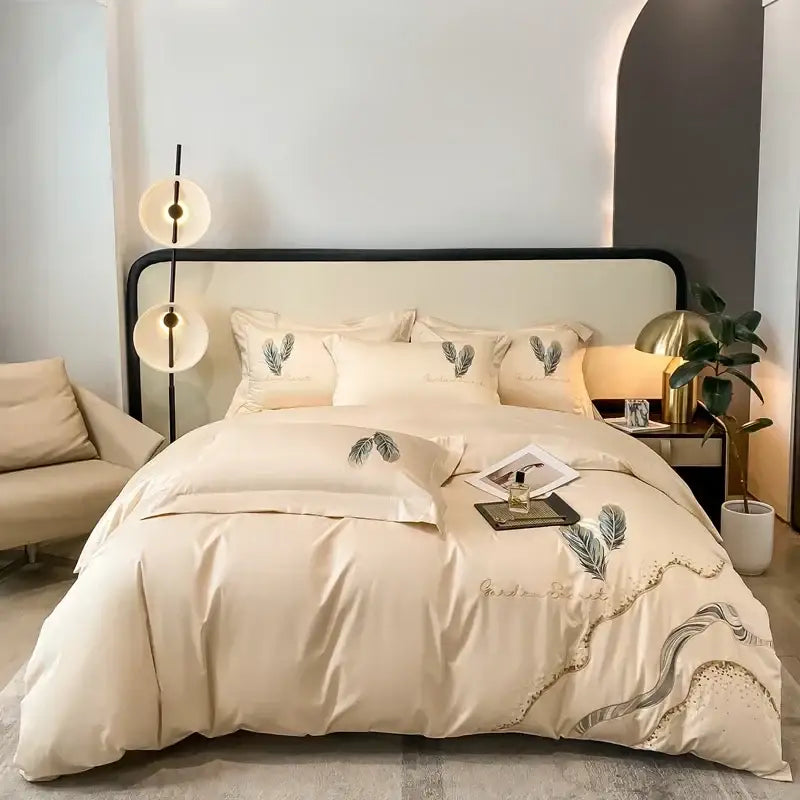 Cream leaf cotton embroidery bed linens set in cream satin with delicate leaf embroidery and gold thread accents for decorbites