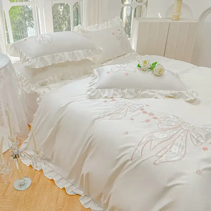 Cream and pink ice silk duvet set with white satin fabric embroidered ruffles and delicate pink bows