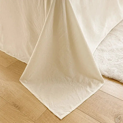 Cream ribbed bubble yarn duvet cover set with cream-colored softly draped textured fabric for bedroom bedding