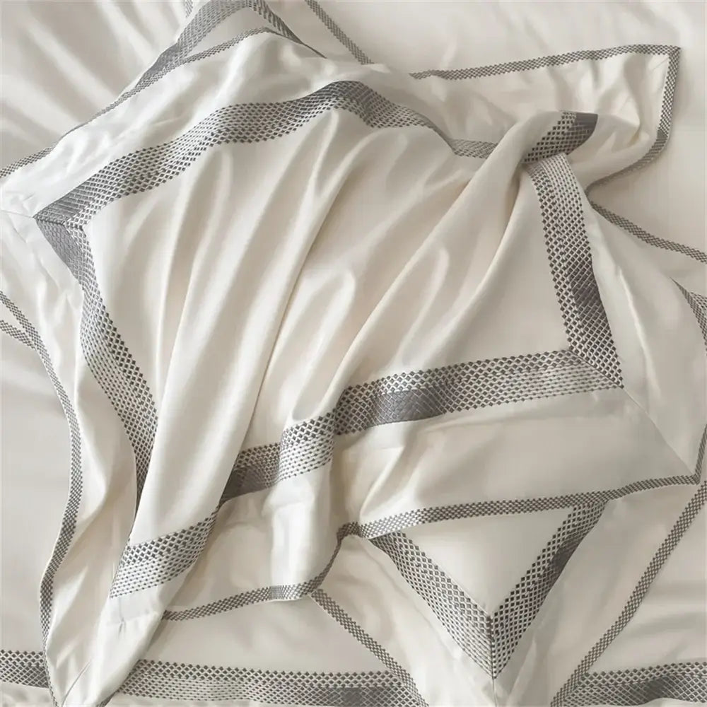 Cream satin 1000tc egyptian cotton bedding set with white duvet cover and geometric gray patterned borders silver piping