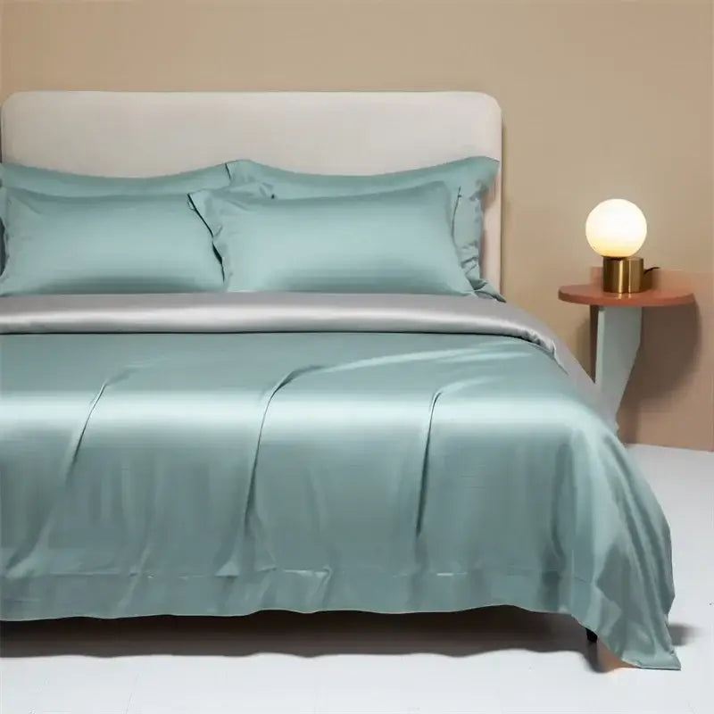 A smooth light teal satin duvet cover with matching pillowcases from decorbites 120s natural fabric bedding set