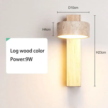 Cream style bedside lamp with log wood finish, cylindrical concrete shade, and slender wooden stem by decorbites cream style