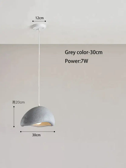 Grey concrete pendant lamp with smooth dome shade and white cord from decorbites cream style cloud collection for dining room decor