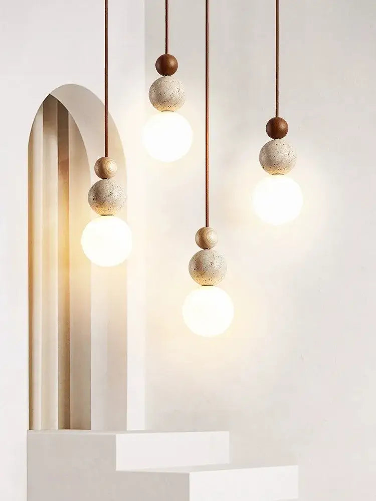 Cream style led pendant lamp by decorbites featuring warm bulbs with textured concrete spheres for bedroom decor