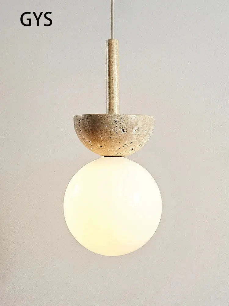 A cream style nordic pendant lamp with a textured beige stone top and frosted glass globe for bedroom decorbites decor
