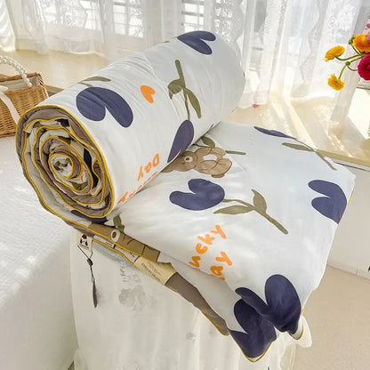 Cream teddy bear breathable double gauze quilt with navy heart flowers and yellow trim for bedroom bedding decorbites breathable double