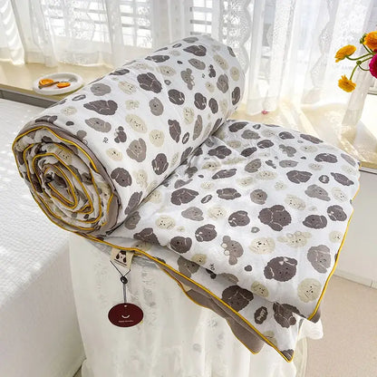 Cream teddy bear double layered soya fibre quilt with soft white fabric and playful gray beige poodle pattern and yellow border