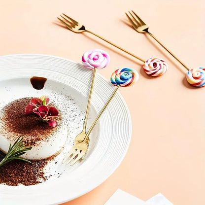 Gold-colored dessert forks with creative candy donut swirled candy rose handles for dining room use
