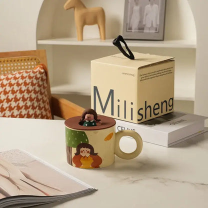 Cream-colored decorbites creative ceramic coffee mug with illustrated girl and miniature doll figurine kitchen decor