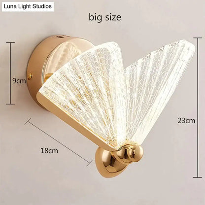 Gold-finished creative colorful butterfly led wall lamp with translucent textured glass fan-shaped diffuser for bedroom use