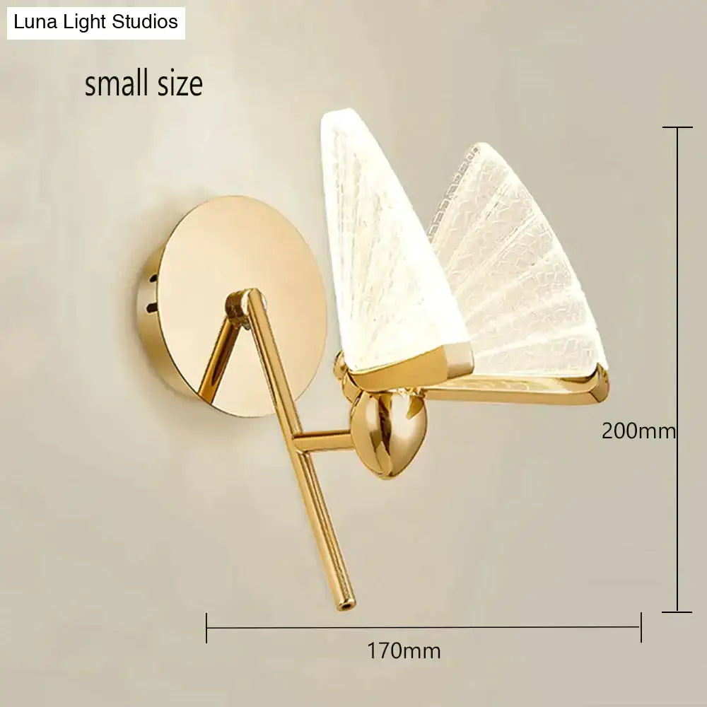 Gold-finished wall sconce with two translucent fan-shaped glass shades for creative colorful butterfly led decor