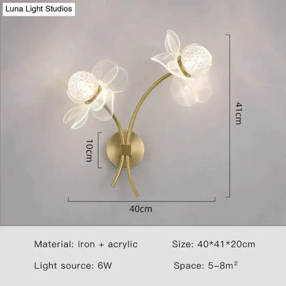 Creative floral decorative gold led wall lamp with translucent acrylic flower-shaped lights and iron base for bedroom