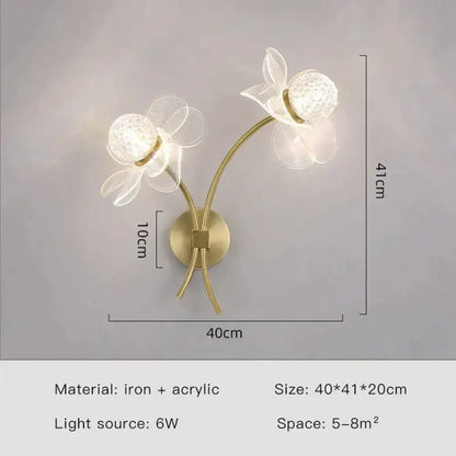 Creative floral decorative gold led wall lamp featuring two flower-shaped iron and acrylic lights with crystal centers