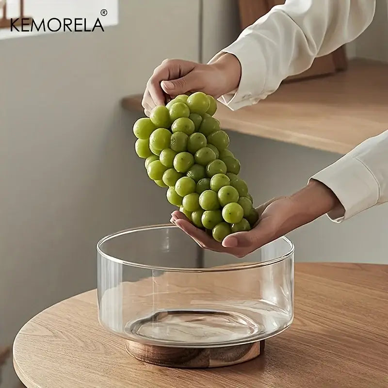 A clear glass fruit bowl with wooden base by kemorela for dining room decorbites creative glass use