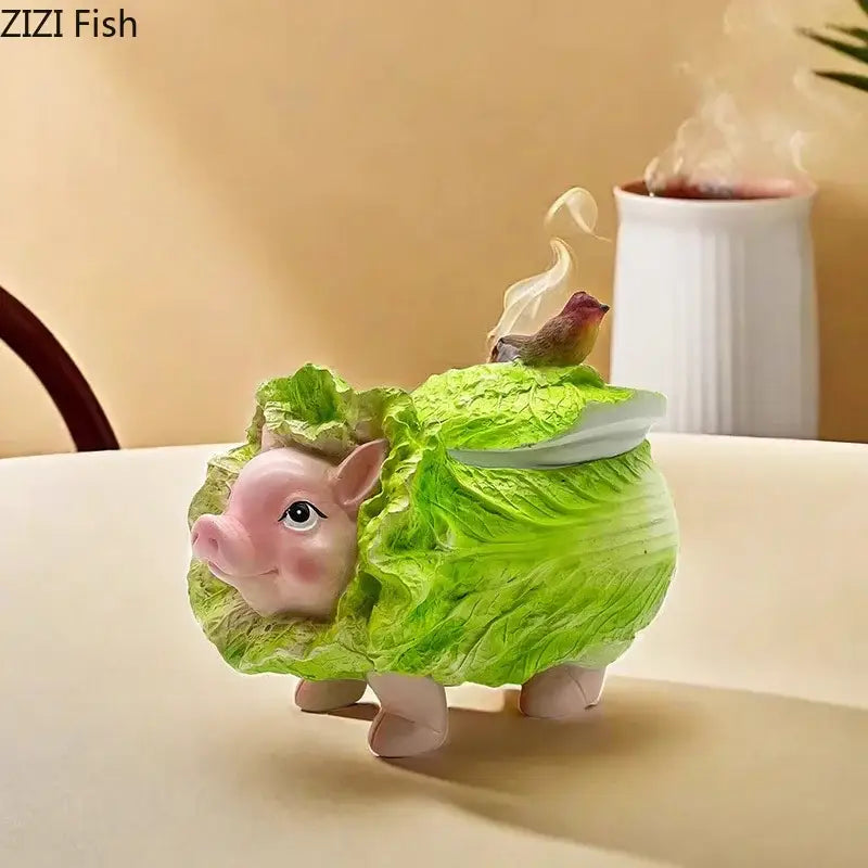 Creative green and pink cabbage pig ashtray made of ceramic with detailed leaf textures and a bird, decorbites cabbage pig