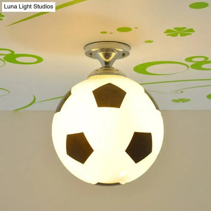 Decorbites™ fun football flushmount ceiling light features a black and white soccer ball design for kid’s room lighting