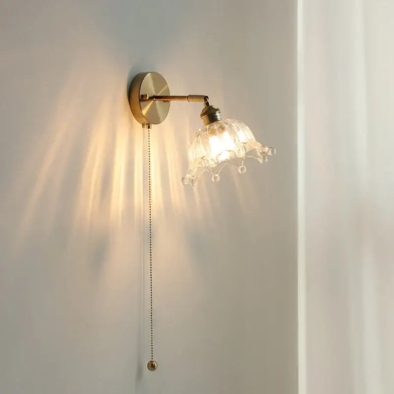 Delicate brass wall sconce with faceted crystal shade and ornate pull chain crown glass led bedroom fixture decorbites crown glass