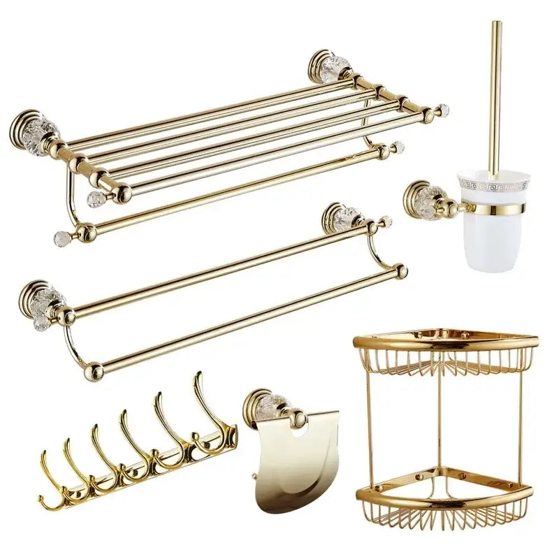 Gold bathroom accessories set featuring crystal-encrusted decorbites brass hardware and white ceramic toilet brush holder