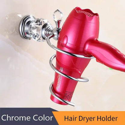 Chrome-finished metal hair dryer holder with crystal accents holding a red hairdryer in a decorbites crystal brass gold bathroom accessory