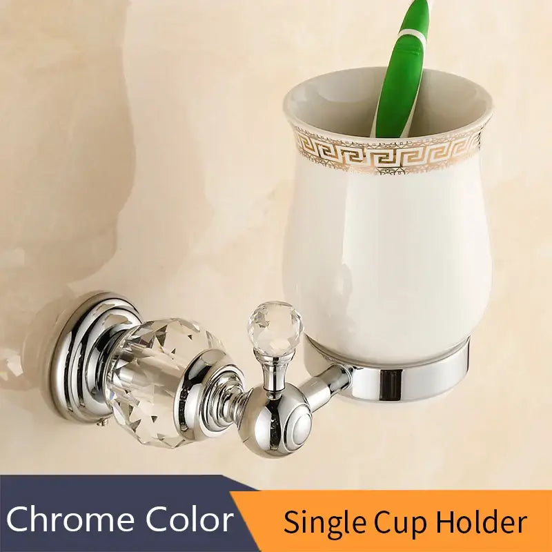 Chrome-finished toothbrush holder with crystal knob and greek key pattern on white ceramic cup for brass gold bathroom decorbites crystal brass gold accessory