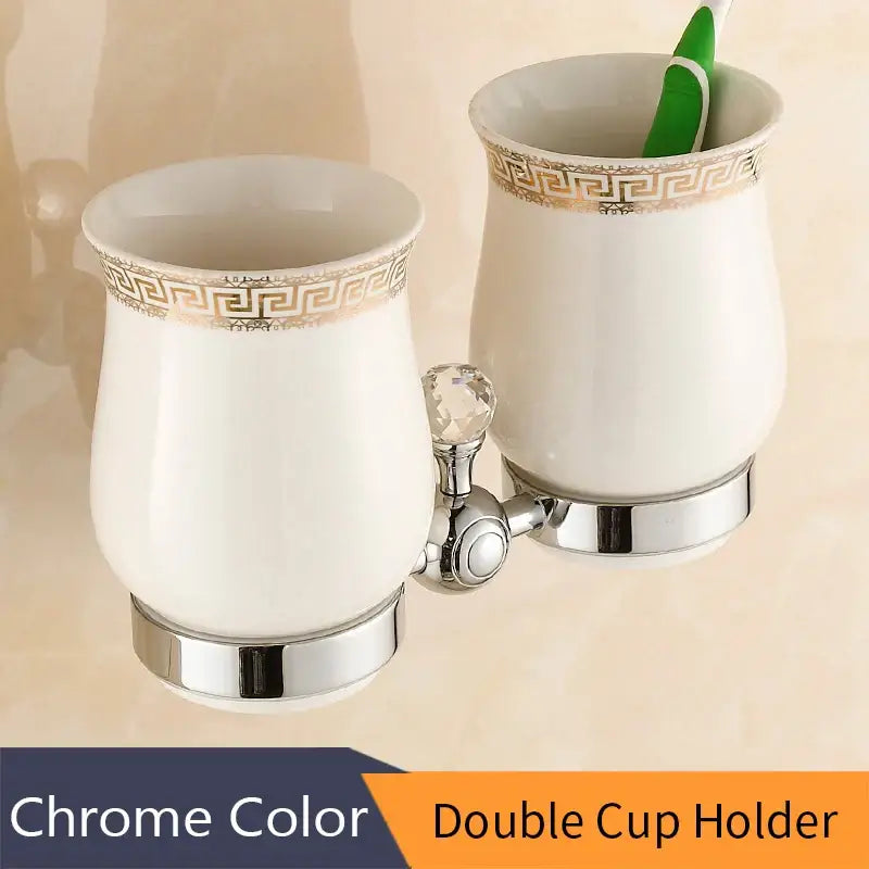 White ceramic double cup holder with gold greek key pattern trim and chrome metal base for brass gold bathroom decorbites crystal brass accessory