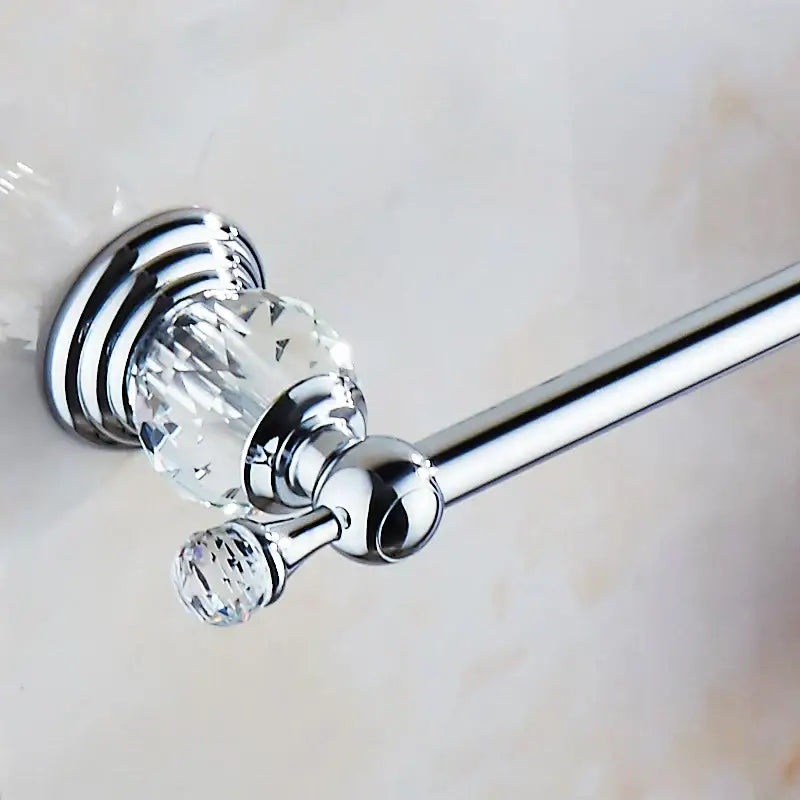 Chrome finished towel bar with faceted crystal accent and decorative spherical knob decorbites crystal chrome towel