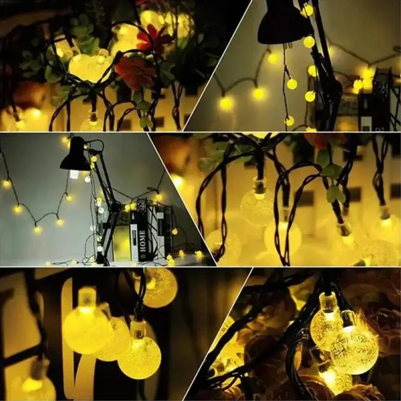 Warm yellow decorbites crystal fairy solar string lights with clear globe bulbs and black wiring for patio decor