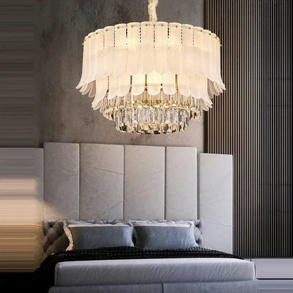 Elegant white feather ceiling pendant with gold accents and crystal droplets for decorbites crystal feather chandelier