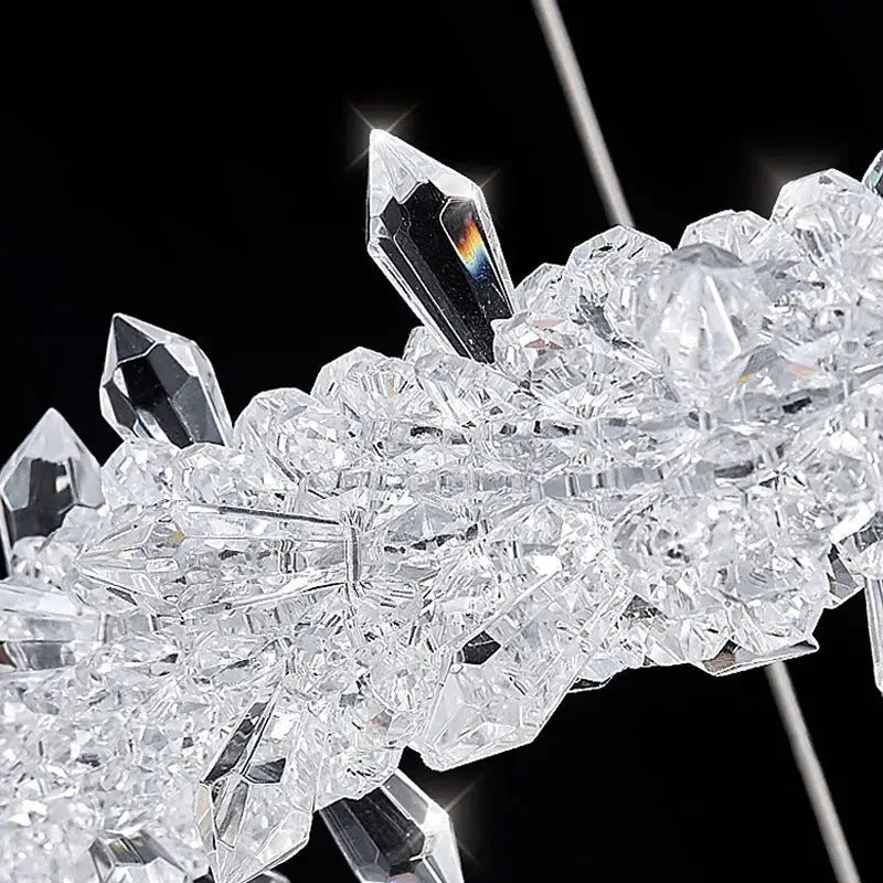 A cluster of clear faceted crystal flower led formations with sharp points for decorbites crystal flower chandelier lighting