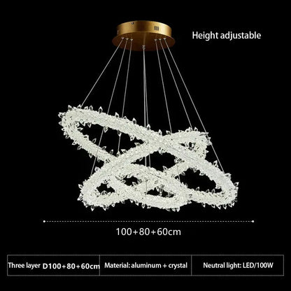 A modern crystal flower led ring chandelier with three-layered intertwined rings and a gold-toned ceiling mount for dining room lighting